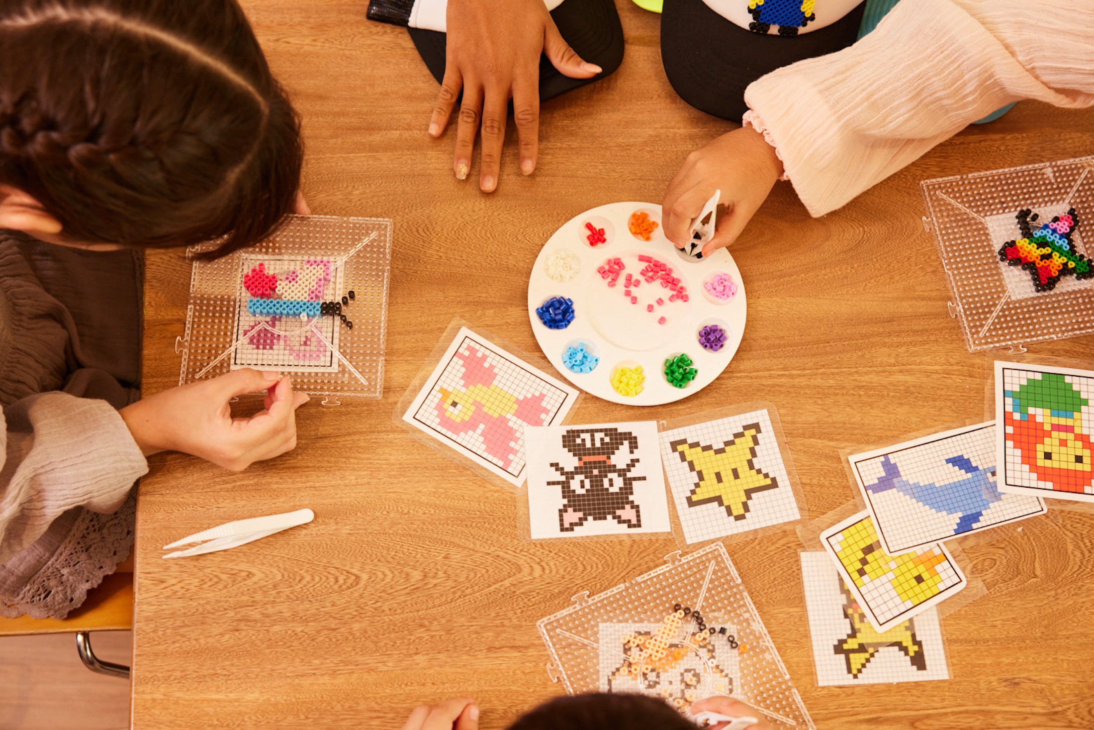 Overhead photo of kids doing crafts