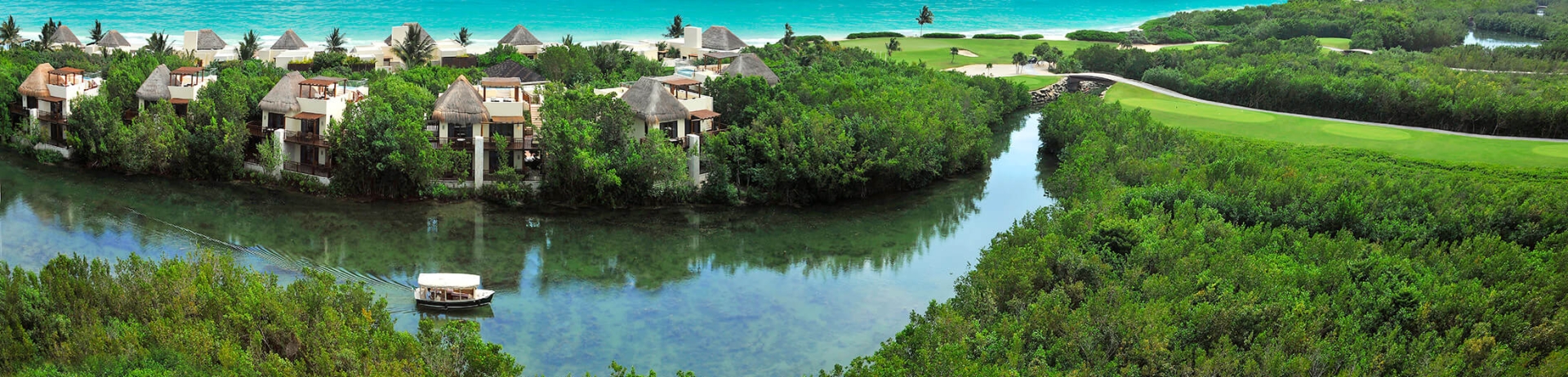 A canal running through the Fairmont Mayakoba community toward the golf course.