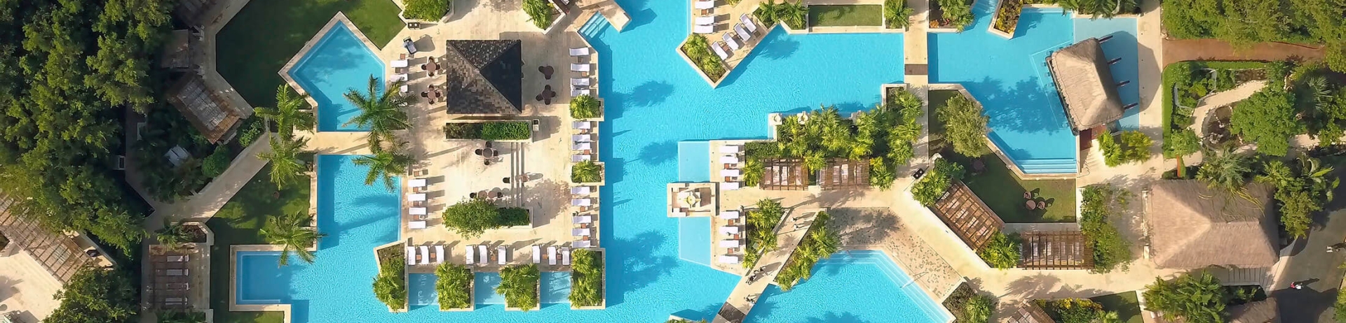 An aerial view of the many outdoor swimming pools at Fairmont Mayakoba hotel in Mexico.