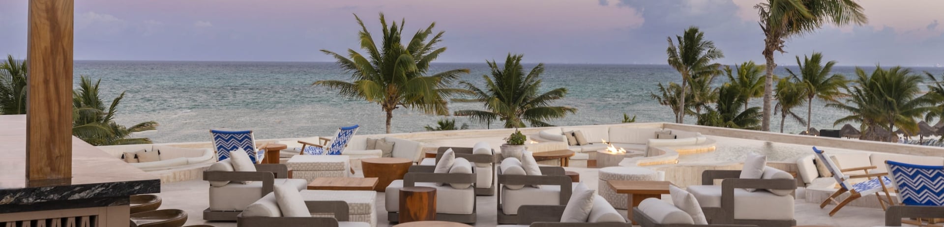 The terrace of Fairmont Mayakoba's Cielo at sunset.