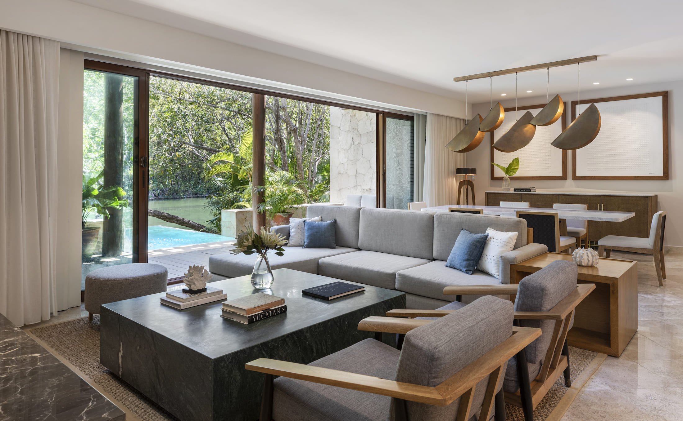 The sitting area of a Fairmont Mayakoba guest suite.