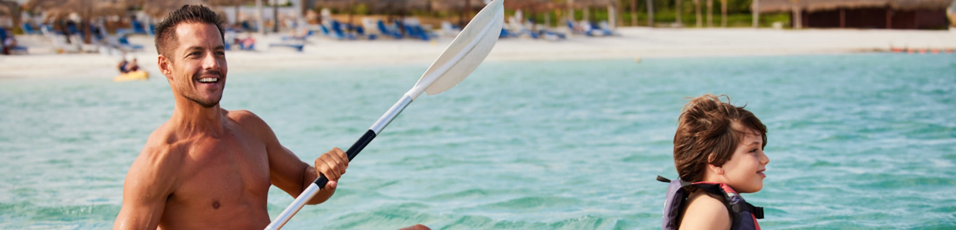A family going canoeing on the ocean