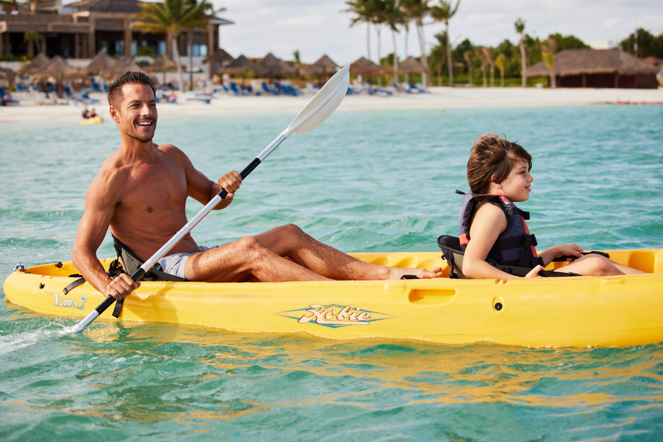 A family going canoeing on the ocean